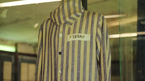 Striped Prisoner Uniform With Identification Number at Stutthof Museum Stock Footage 339771565