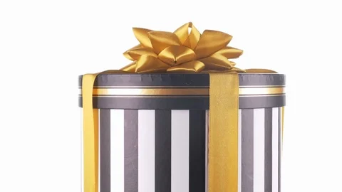 Striped round gift box with a gold bow. rotation Stock Footage 120153281
