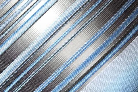 A striped silky textile with diagonal pattern Stock Photos