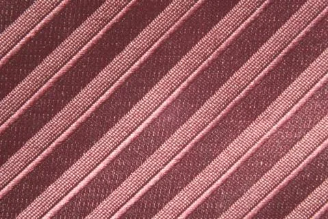 A striped silky textile with diagonal pattern Stock Photos