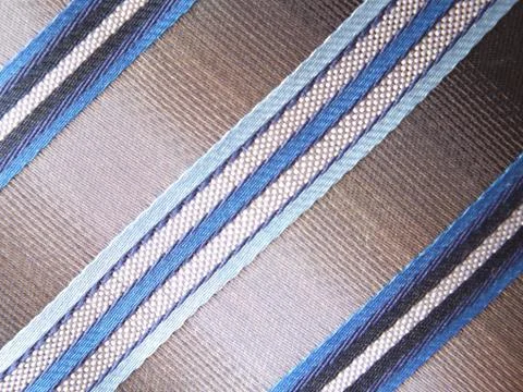 A striped silky textile with diagonal pattern Stock Photos