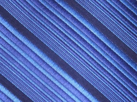 A striped silky textile with diagonal pattern Stock Photos
