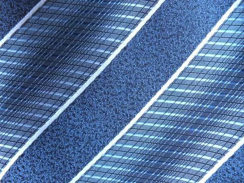 A striped silky textile with diagonal pattern Stock Photos