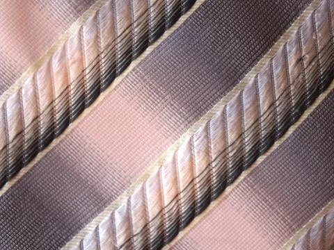 A striped silky textile with diagonal pattern Stock Photos