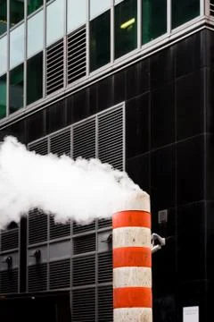 Striped smoke stack and office exterior, Times Square, New York, USA 스톡 사진