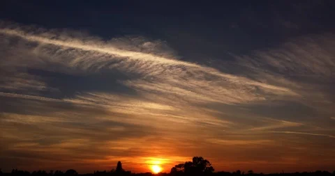 Striped Sunset Clouds Time Lapse (2160p 25fps) Stock Footage 98895633