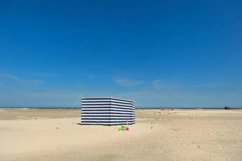 Striped windbreak at the beach Striped wind break at the beach Copyright: ... Stock Photos