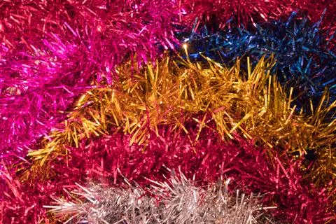 Stripes of colored tinsel. Stock Photos