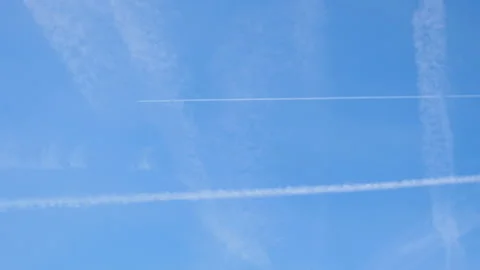 Stripes in the sky from aircraft. Selective focus. Stock Footage 185636869