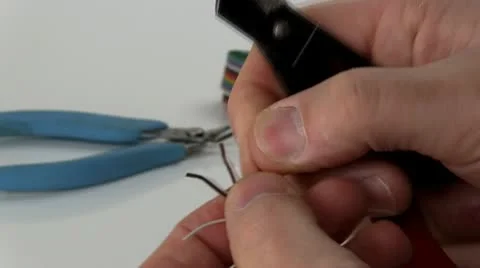 Stripping and preparing wires Stock Footage 10588960