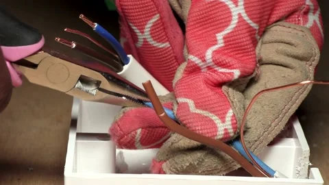 Stripping a wire Stock Footage 234749516