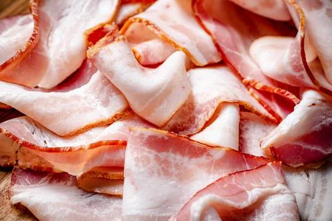 Strips of bacon. Macro background. Stock Photos