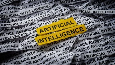 Strips of newspaper with the words Artificial Intelligence typed on them. Stock Photos