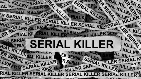 Strips of newspaper with the words Serial Killer typed on them Stock Footage 252209422
