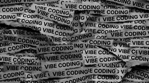 Strips of newspaper with the words Vibe Coding typed on them. Stock Footage 347721445