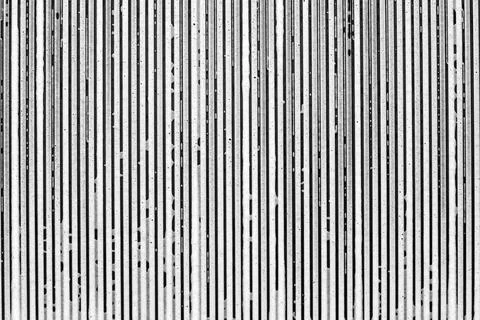 Strips from soapsuds on a black background Stock Photos