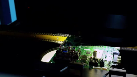 Strobe flashes illuminate a PCB on a modern conveyor 스톡 동영상 337476514