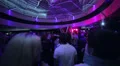 Strobe light splashes people dance at night club party HD Footage