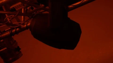 Strobe lights emitting different color beams hanging under the ceiling Video stock 80478821