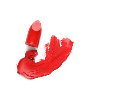 Stroke and lipstick on white background, top view Stock Photos