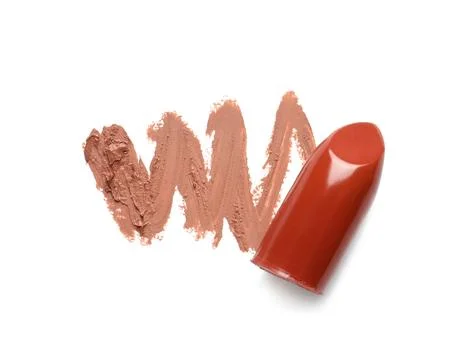 Stroke and lipstick on white background, top view Stock Photos