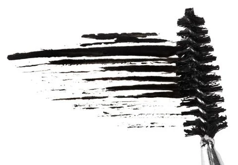 Stroke of black mascara with applicator brush, isolated on white macro Foto stock