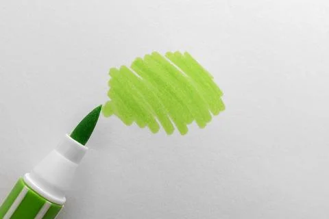 Stroke drawn with light green marker and highlighter isolated on white, top.. Stock Photos