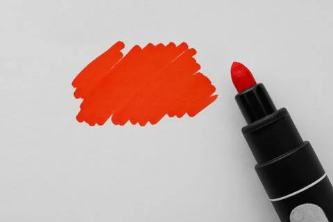 Stroke drawn with orange marker and highlighter isolated on white, top view Stockfoto's