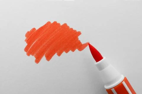 Stroke drawn with orange marker and highlighter isolated on white, top view Stock Photos