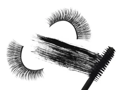 Stroke (sample) of black mascara and false eyelash isolated on white macro Foto stock