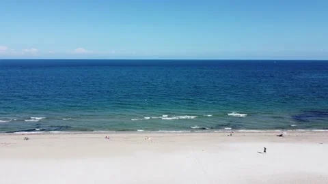 A stroll on the beach on a sunny day Stock Footage 162480609