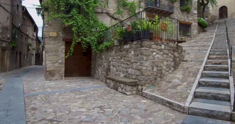 Stroll through the cobbled streets of a medieval village. Subjective vision. Video stock 231390191