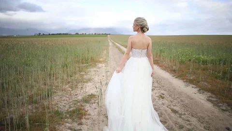 Strolling Along A Dirt Road Stock-Footage 114888019