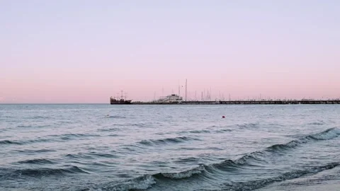 Strolling Along the Pier: Embracing the Sunset and Ocean Breeze Stock Footage 292785069