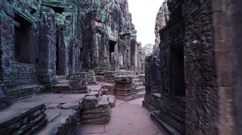 Strolling on an Ancient Pathway at Bayon Temple in Cambodia. Video 4k Stock Footage 59932821