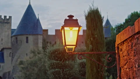 Strolling at night through the streets of the ancient medieval castle-fortress Stock Footage 318000583