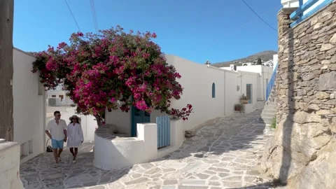 Strolling through the charming streets of Paros, Greece on a sunny day Stock Footage 337359032
