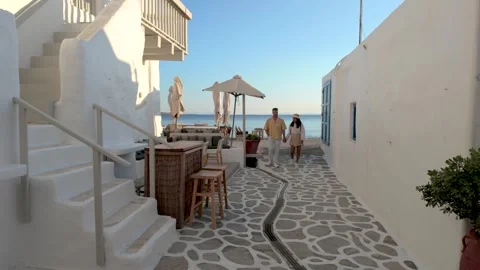 Strolling through charming streets on Paros Island, Greece under the golden sun Stock Footage 337373487