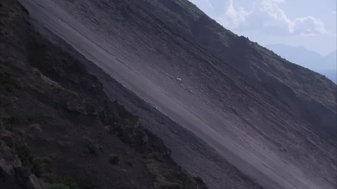 Stromboli Cliffside Sloping Down into Ocean Stock Footage 86753942