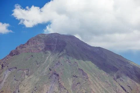 Stromboli's peak touched by a cloud Stock Photos