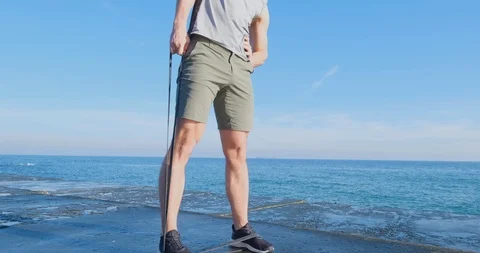 Strong athlete training on beach Stock Footage 122689852