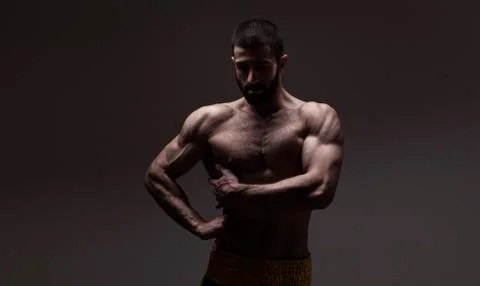 Strong athletic man on black background Foto stock
