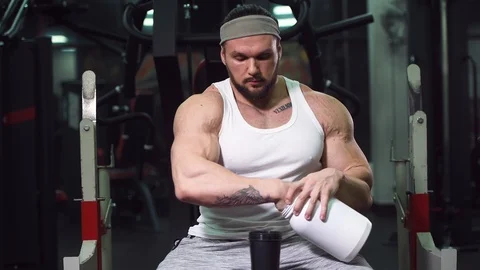 Strong athletic man pumping up muscles workout bodybuilding Video stock 100052267