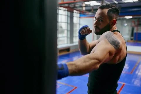 Strong bearded guy preparing for a competition Stock Photos