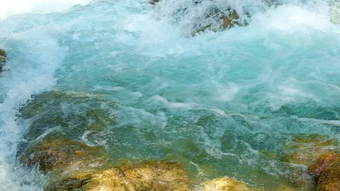 A strong clean mountain river, water beating stones Stock Footage 166460892
