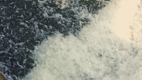 Strong current of river water. Flow of water over stones in a river. Stock Footage 311275284