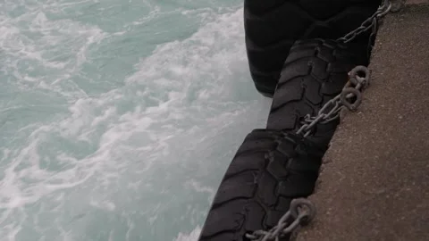 Strong currents river docks fender tire Stock Footage 263017959