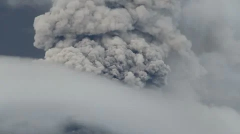 Strong eruption of tungurahua volcanoe in ecuador cloud of ash and eyeglasses Stock Footage