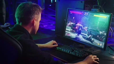 Strong fighter warrior hero knocking out the opponent in the pc video game Stock Footage 248843924