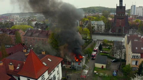 Strong fire in a residential building. Black smoke in the sky. Stock Footage 192810799